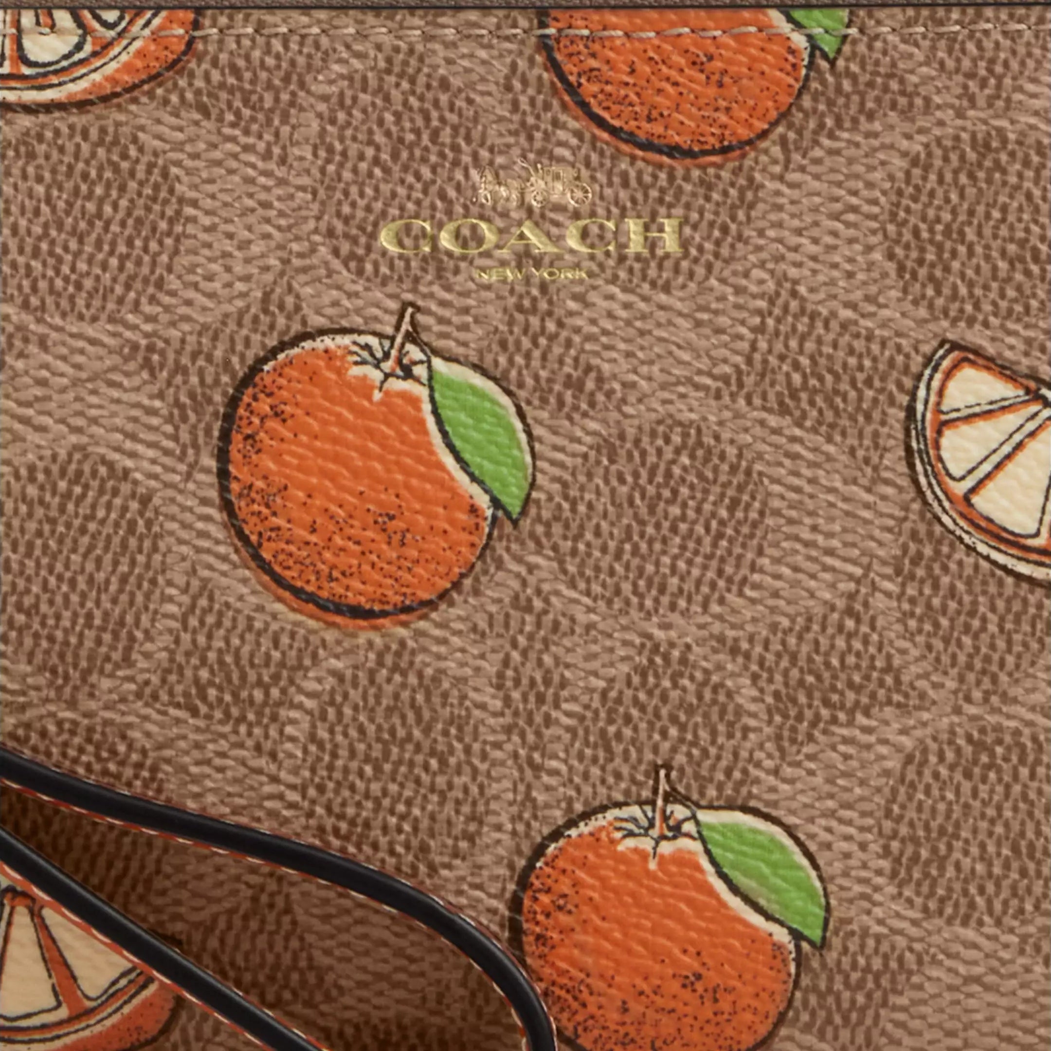 Corner Zip Wristlet In Signature Canvas